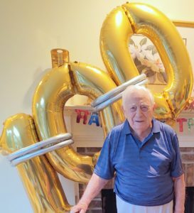 In honor of Centennial Brother Gene Luntey (center) on his 100th Birthday.