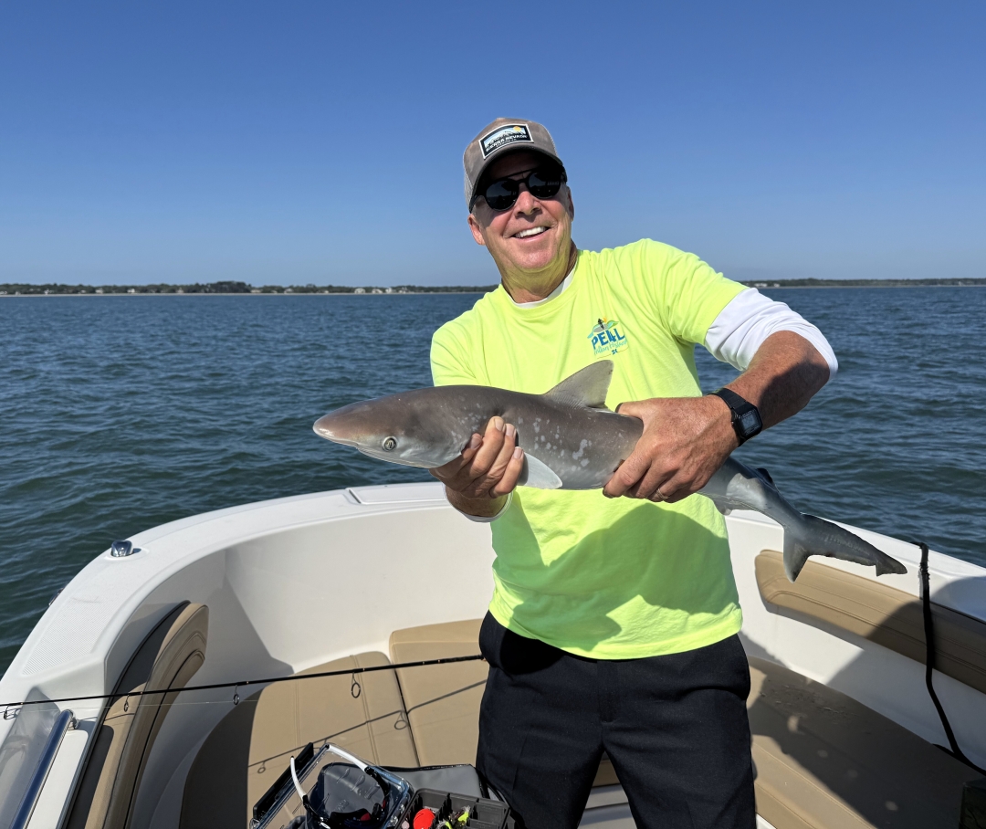 Mike Williamson caught a spirited fighting shark on the May 16th Sigma Chi Alumni Chapter fishing excursion!