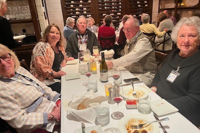 Brothers and guests enjoying one of the 3 courses with wine pairings